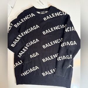 Authentic Balenciaga Black Crewneck Sweater with Real Real Tags still on it.